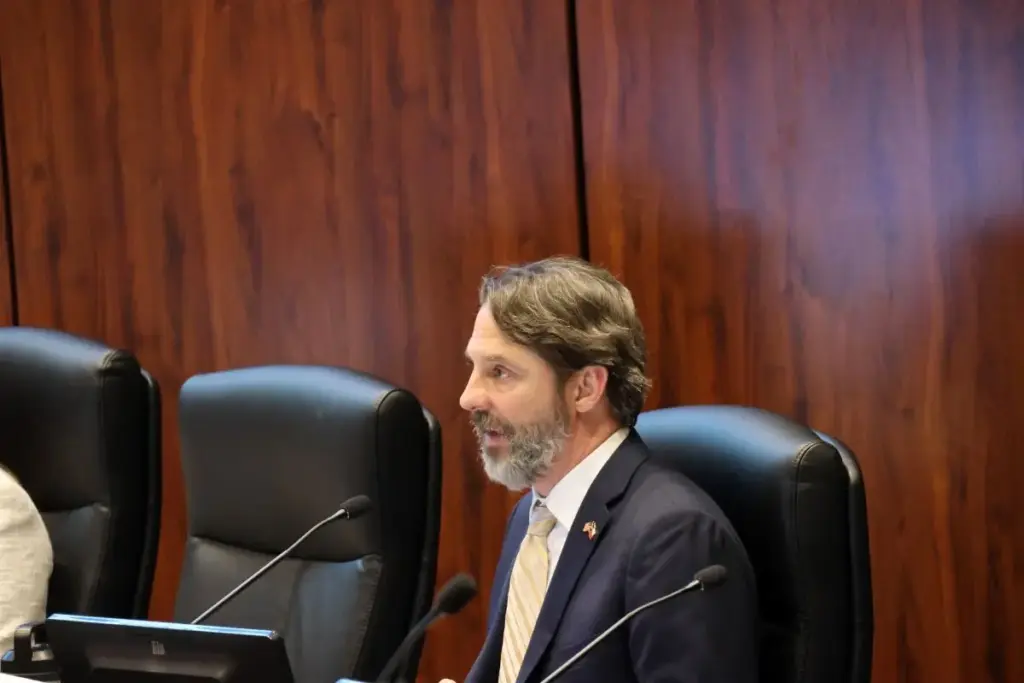 Shelby Williams on the dais at Plano City Council