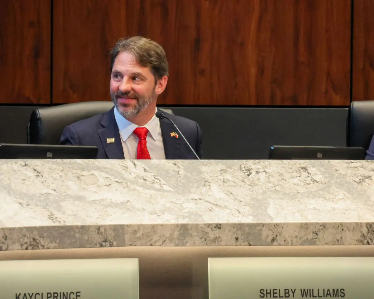Shelby Williams at the Plano City Council dais